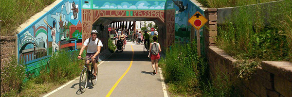 people riding on bikes on hank aaron state trail