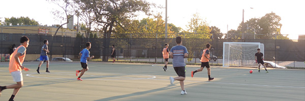 people playing on the futsal court